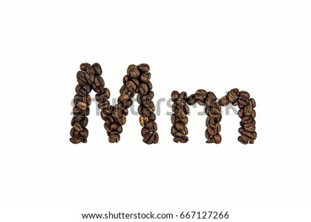 the letter M of coffee beans on white background, Latin alphabet. Letters for advertising