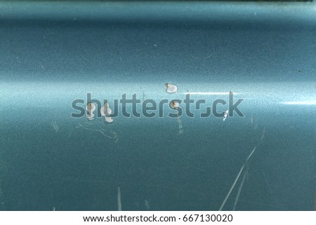 dent and paint scratch in car horizontal image after accident, car insurance concept