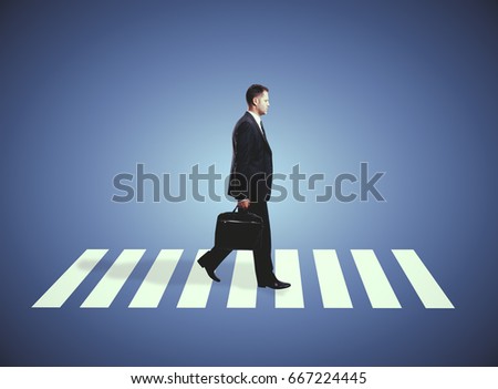 Side view of businessman wth briefcase walking on crosswalk. Purple background