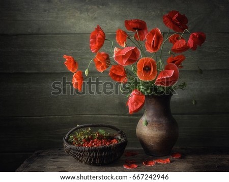 Still life with poppies and strawberries