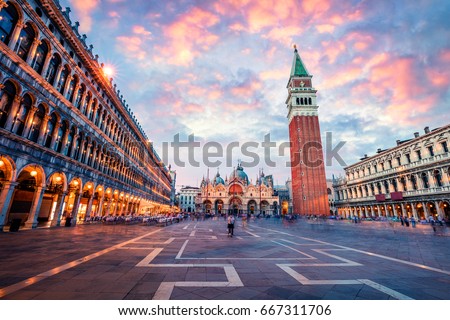 Fantastic sunset on San Marco square with Campanile and Saint Mark's Basilica. Colorful evening cityscape of Venice, Italy, Europe. Traveling concept background. Artistic style post processed photo.

