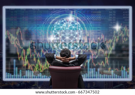 Back side of sitting businessman who is looking at the technology digital virtual screen over the cityscape and brain shape and trading graph background, Business and technology concept