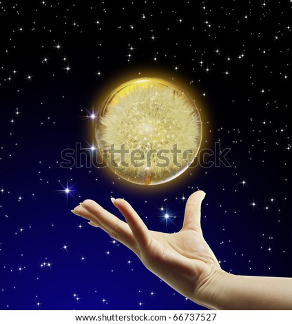 Beautiful hands with the world and the stars