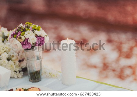 the bride's bouquet and candle