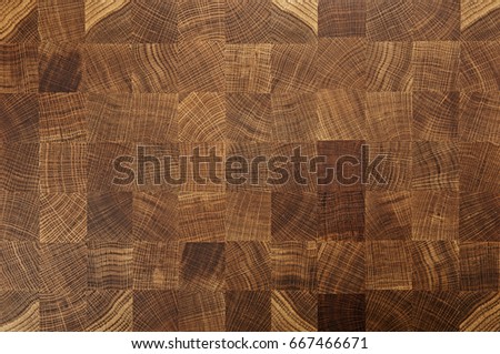 Oak wood butcher end grain chopping block board Royalty-Free Stock Photo #667466671