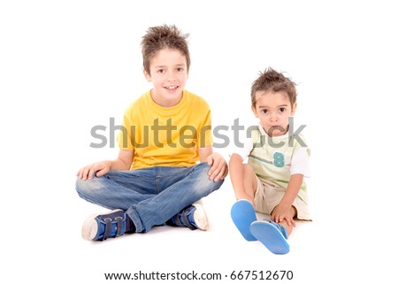 little boy with brother playing