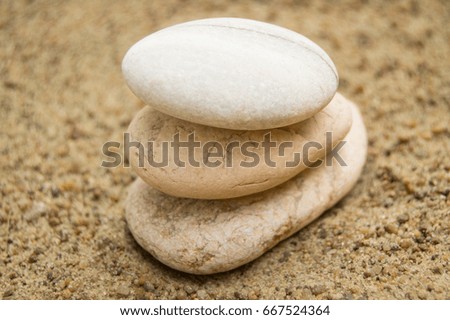 Zen stones on the beach for a perfect meditation, a blurred background.