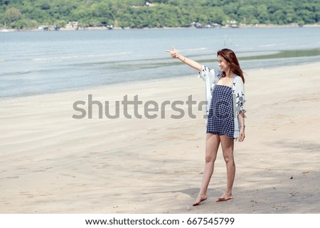 fashion portrait of a girl on the sea