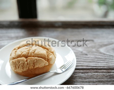 Bread on wooden table.