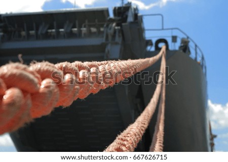 hawser and transport ship, close up, shallow depth of field