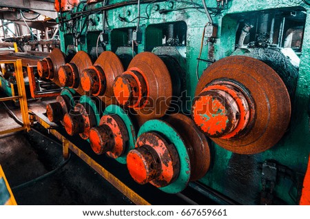 Metal rolling machine. Metallurgical plant. Texture of metal. industry. Background