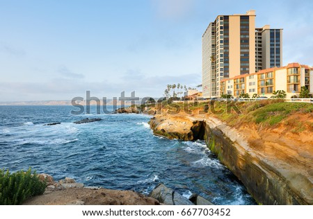La Jolla Cove on a late afternoon, San Diego, California. Photo showing the beach and surrounding cliffs. The Cove is protected as part of a marine reserve.
