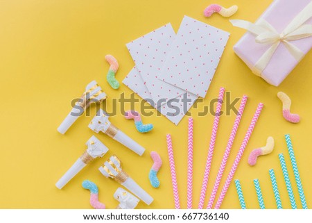 Birthday greeting cards on yellow background top view copyspace