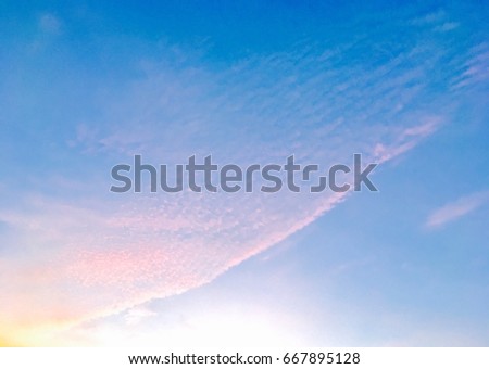 Amazing with bright colorful sky in the evening. Sky, Bright Blue, Orange And Yellow Colors Sunset. Instant Photo, Toned Image. sunset sky with rays of light shining clouds and Sky Background