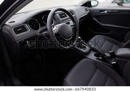 Driver's seat of the car.interior car Royalty-Free Stock Photo #667940833