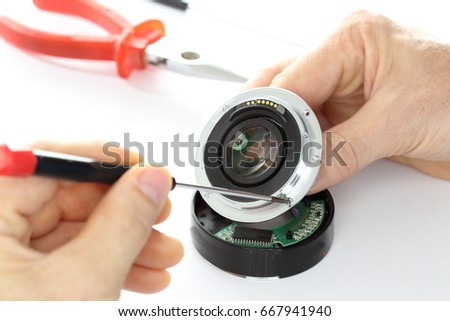 detail shot of an opened optical device Royalty-Free Stock Photo #667941940