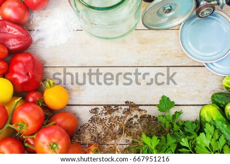 Preservation, pickling vegetables of tomatoes and cucumbers. Selective focus. 