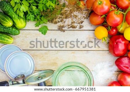 Preservation, pickling vegetables of tomatoes and cucumbers. Selective focus. 