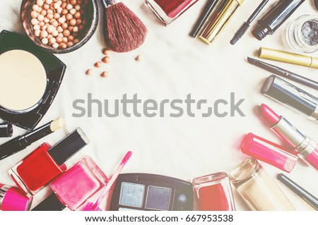 Decorative cosmetics on a white background. Selective focus.