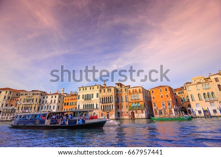 Amazing view on the beautiful Venice, Italy. Boats sailing on the canal.