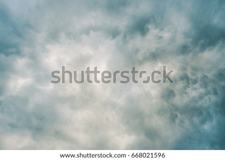 Dramatic dark blue sky with stormy clouds