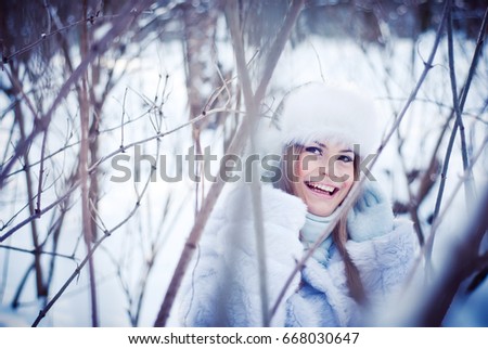 Girl in the winter park
