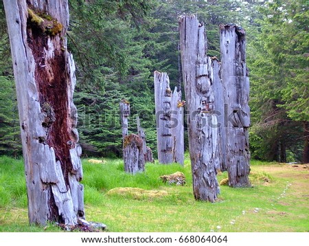 Historic Totem Poles, Ninstints, Haida Gwaii, British Columbia, Canada Royalty-Free Stock Photo #668064064