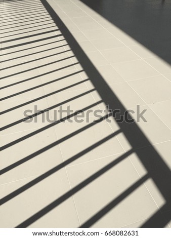 Texture of shadow on the floor.