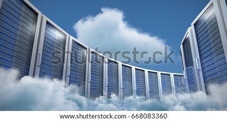 Server towers against scenic view of white cloud against sky