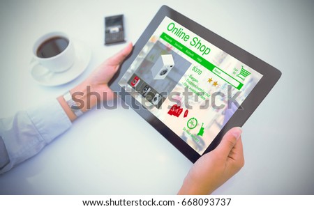 Man using tablet pc against washing machines for sale displayed on web page