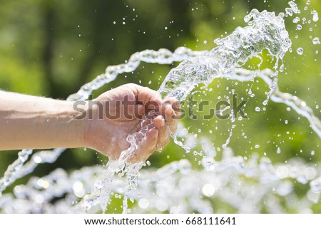 Hand in the fountain
