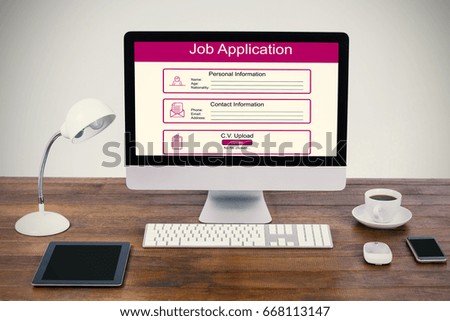 Digitally generated image of Job Application  against computer with digital tablet and mobile phone on desk