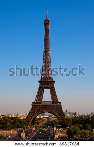 Eiffel Tower in Paris, France on a background of the blue sky