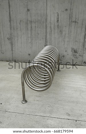 steel bicycle stand on concrete background