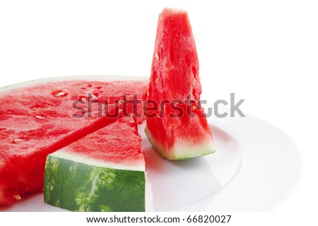 image of red watermelon over white plate