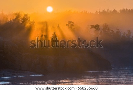  Misty sunsets on Lake Ladoga. The Republic of Karelia.
