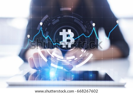 Cryptocurrency graph on virtual screen. Business, Finance and technology concept. Bitcoin, Ethereum. Royalty-Free Stock Photo #668267602