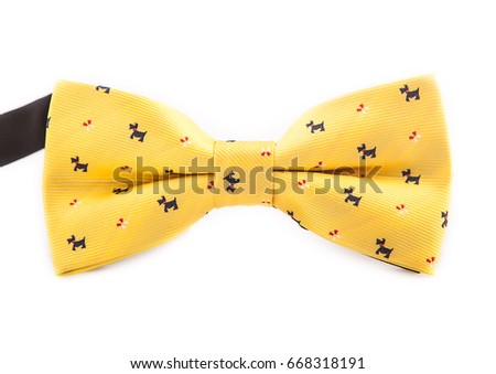 Yellow bow with icons close-up for parties, weddings, isolate on white background