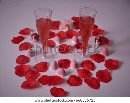 Wineglass and flower petals