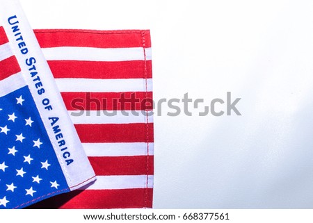 Close up Beautifully star and striped United States of America flag  on plain background with space for text