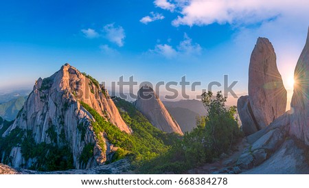 Bukhansan mountain in Seoul at Sunrise in the Morning in Bukhansan National Park, South Korea Royalty-Free Stock Photo #668384278