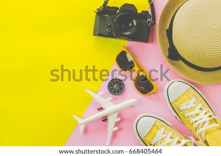 Clothing accessories to travel for summer on multicolor paper floor - concept  lifestyle