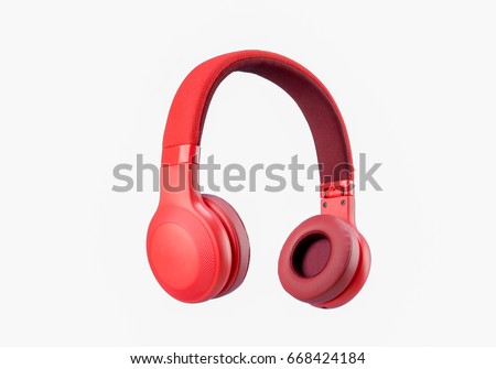 Red headphone isolate on white background. Royalty-Free Stock Photo #668424184