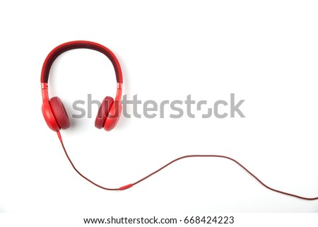 Red headphone isolate on white background. Royalty-Free Stock Photo #668424223