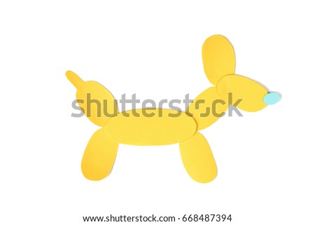 Balloon dog paper cut on white background - isolated (handmade paper cut, not illustration)