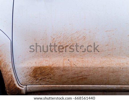 Splashes of mud. Close up of a white car mud splash. Background texture.