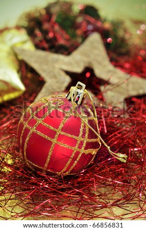 red and golden christmas ball and other christmas ornaments