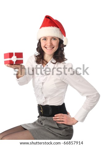 Happy young beautiful business lady offering a present isolated on white
