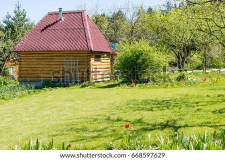 Clean house, wooden architecture, log house, Russian bath. Countryside landscape