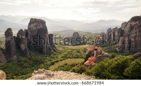 Landscape view of Meteora rock formations and it's monasteries in the Pindos Mountains, Greece